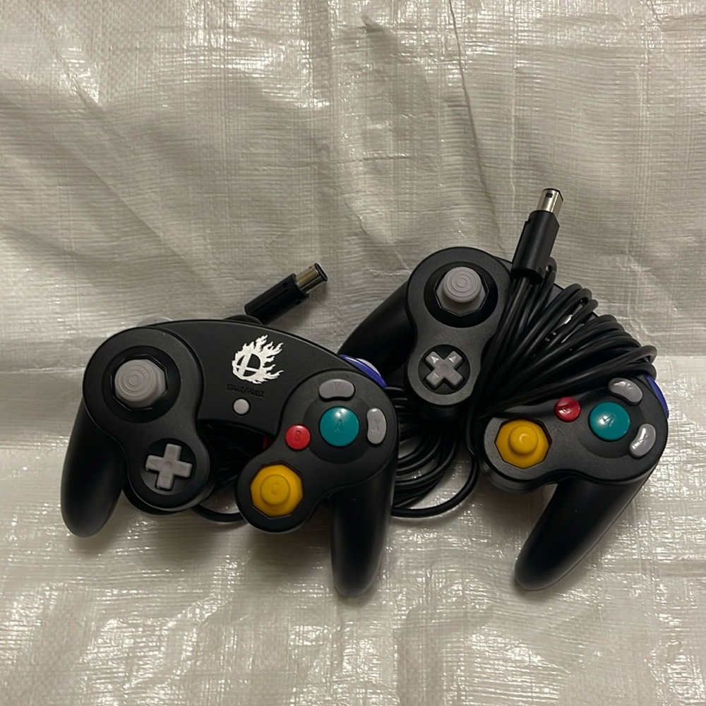 2 rereleased Nintendo GameCube controllers for Super Smash.